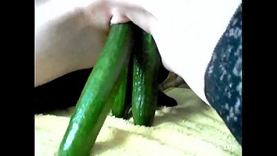 extreme unexperienced pounds a whiskey bottle and cucumbers